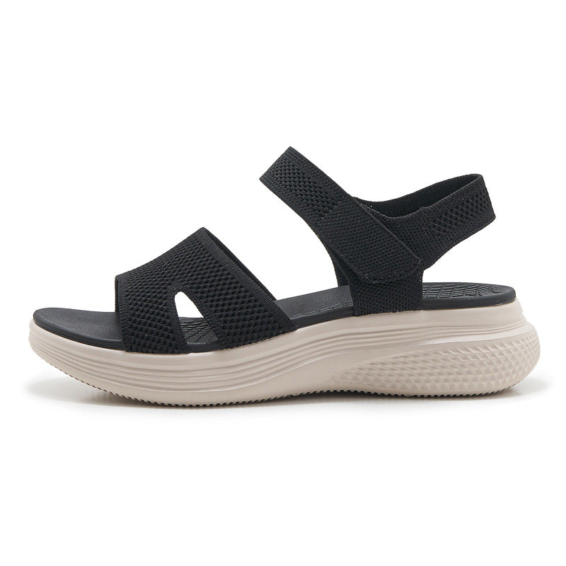 Orthoshift knit sandal in black, side profile